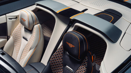 Overhead shot of the driver’s cockpit and passenger seat in the Bentley Batur Convertible, with luxury stitching and sports racing car aesthetics