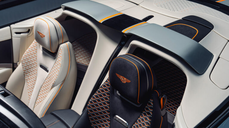 Overhead shot of the driver’s cockpit and passenger seat in the Bentley Batur Convertible, with luxury stitching and sports racing car aesthetics