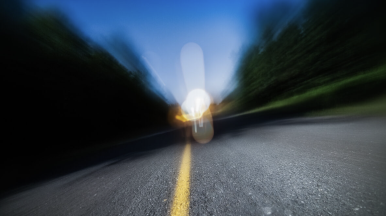 Blurred image of a road.