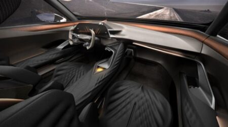 The interior of the Cupra Tindaya Showcar with the metallic-finish Toray Ultrasuede nu sustainable material used across the dash, door panels, center console and steering wheel