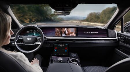 GM to launch eyes-off driving and conversational AI The dashboard and windshield in a Cadillac with Level 3 ADAS. The driver does not have their hands on the wheel