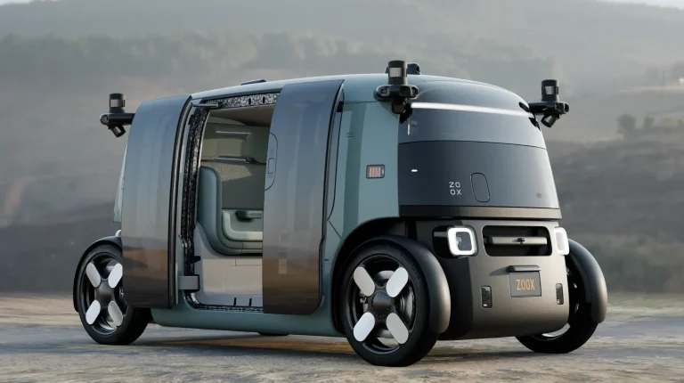 Profile photo of the grey Zoox robotaxi.