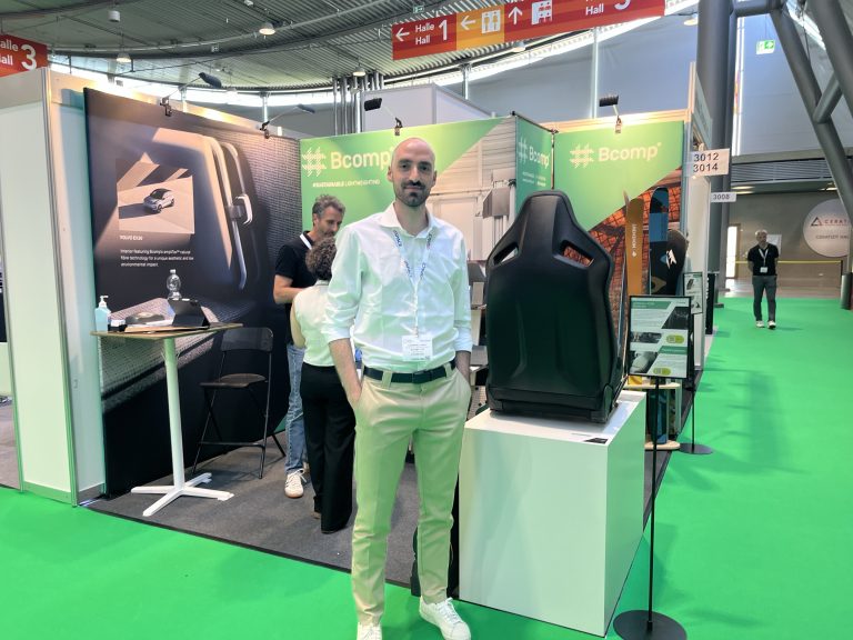 Carmine Landi, automotive customer project engineer at Bcomp, stands on the show floor at Automotive Interiors Expo 2026
