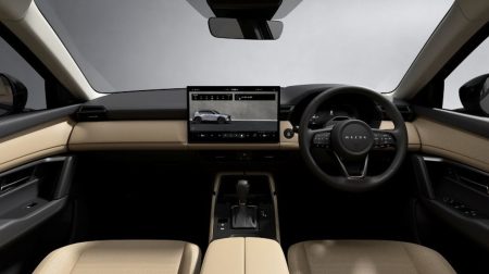 Mazda selects Panasonic cockpit domain controller for new CX-5 The dashboard of the all-new Mazda CX-5 with a center display, steering wheel and light brown color.