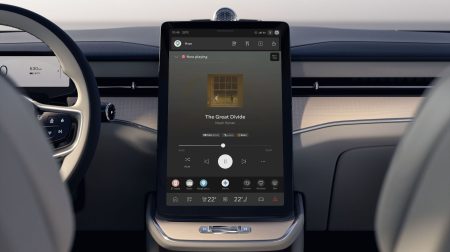 Apple Music displayed on a touchscreen in a Volvo vehicle.