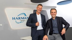 Left Dr. Thomas Irawan and Right Christian Sobottka, CEO of Harman and President, Harman Automotive.